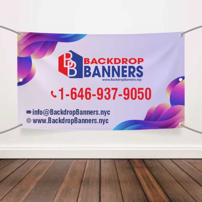 Colorful vinyl banners hanging outdoors promoting a sale event.