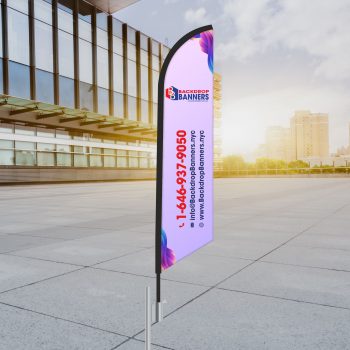 Feather flags with custom graphics for promoting a grand opening.